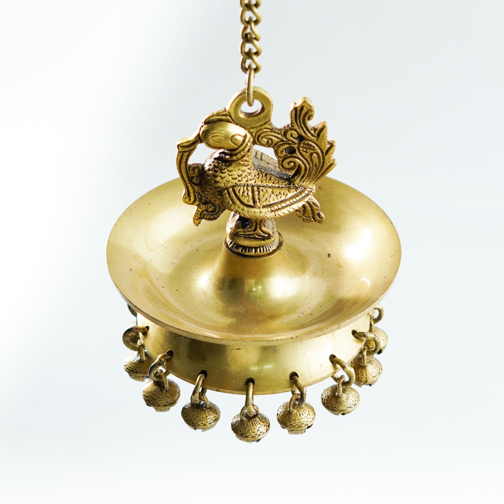 annapakshi brass wall hanging diya closeup