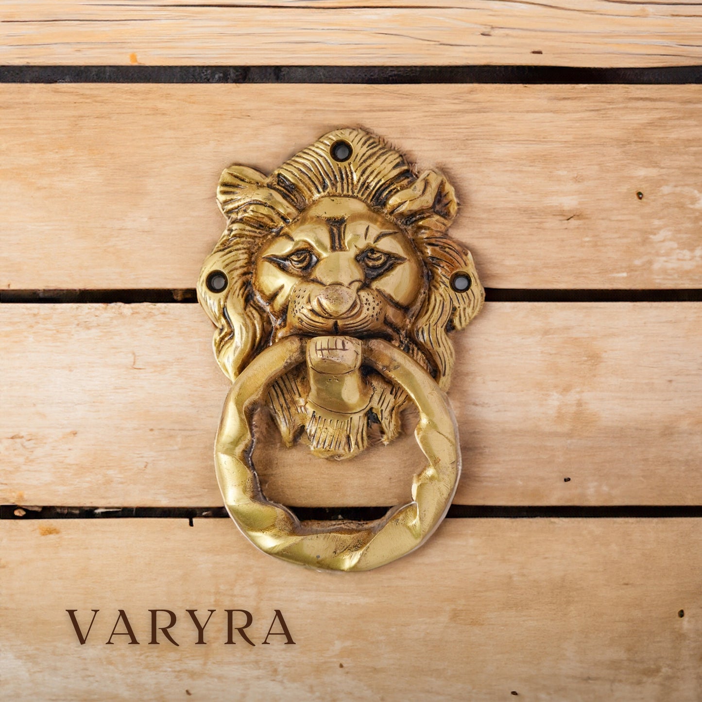 lion door knocker with wavy ring brass by varyra